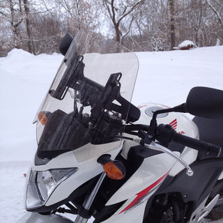 Adjustable motorcycle windscreen